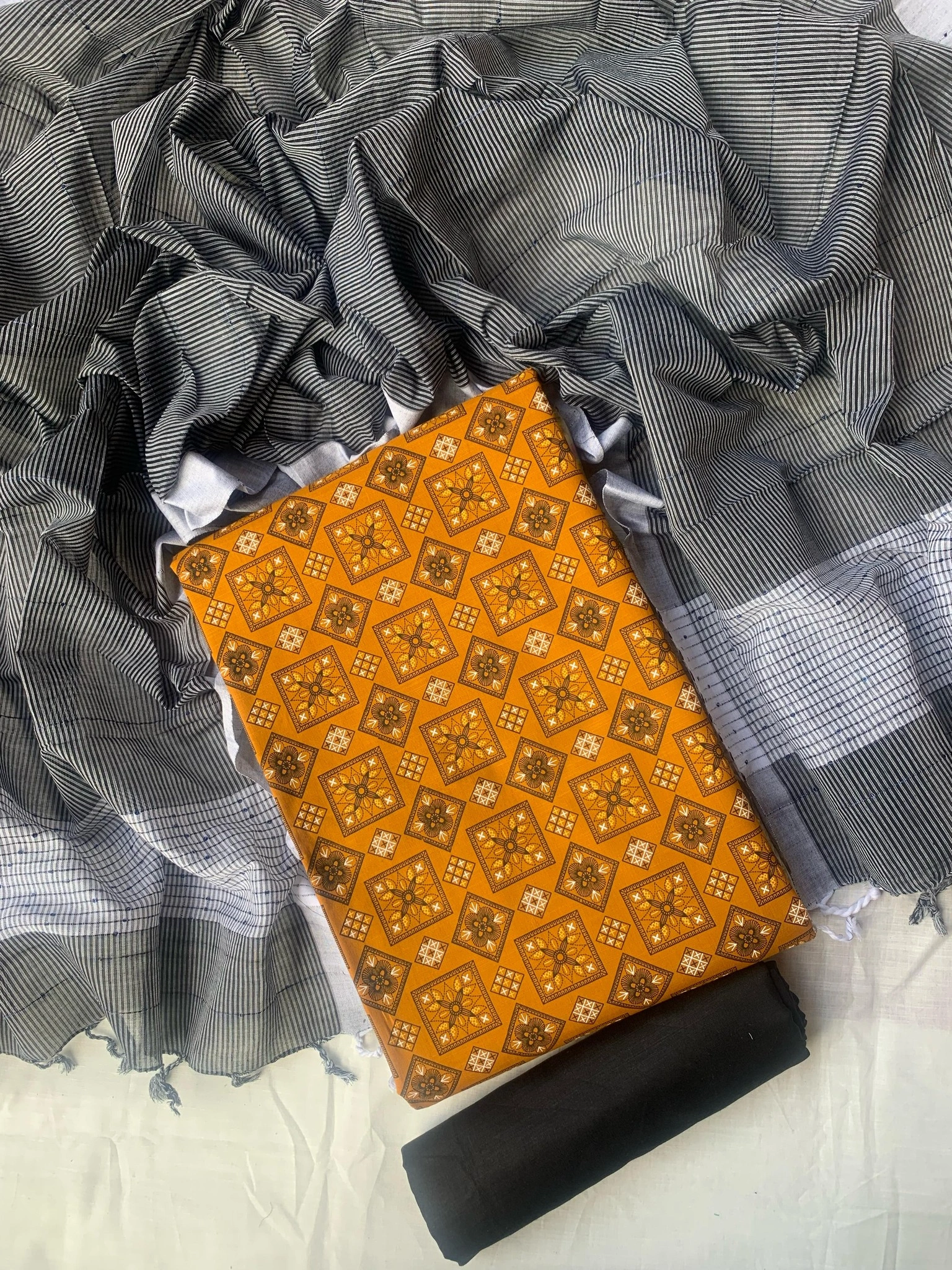 Unstitched Slub cotton three-piece.